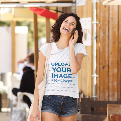 Heather T-Shirt Mockup of a Happy Woman on the Phone