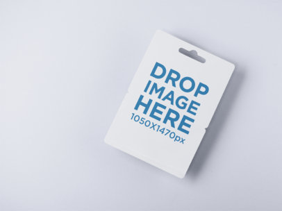 Angled Gift Card Mockup Lying on a Solid Surface