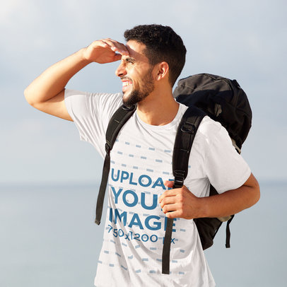 T-Shirt Mockup Featuring a Man Backpacking
