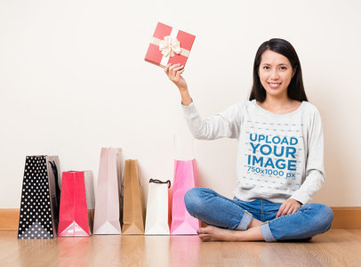 Long Sleeve Tee Mockup of a Woman Showing Off Some Presents 46716-r-el2