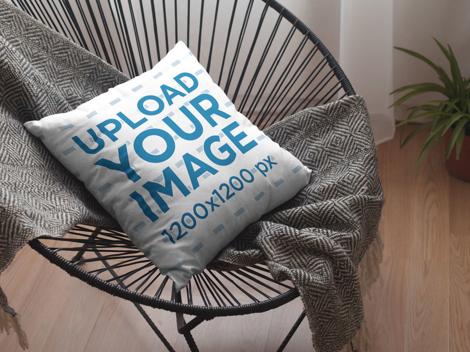Template of a Pillow Lying on a Black Acapulco Chair