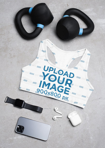 Sublimated Sports Bra Mockup Featuring Kettlebells and Fitness Gadgets