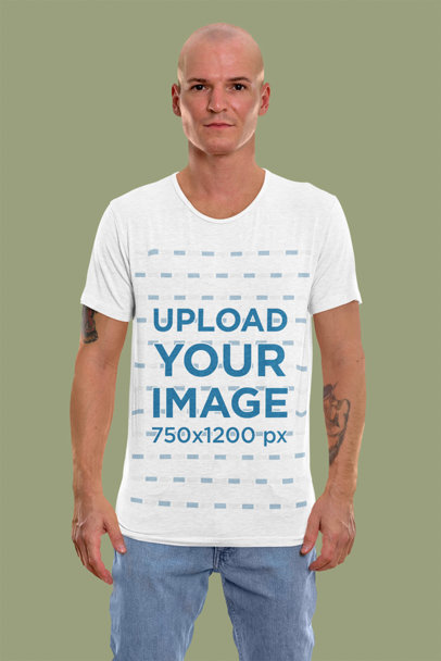 Mockup of a Tattooed Man Wearing a T-Shirt in a Studio