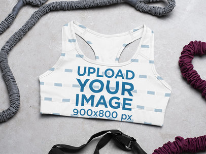 Mockup of a Sports Bra Surrounded by Equipment
