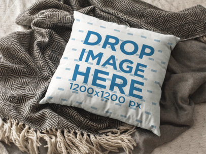 Pillow Template Lying on a Gray Blanket in the Floor a15169