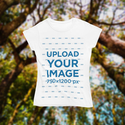  Mockup of a Women's T-Shirt Against a Spring-Themed Background m1416
