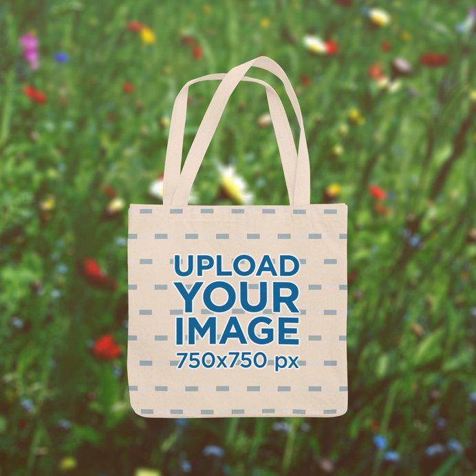 Tote Bag Mockup Featuring a Spring-Themed Background 
