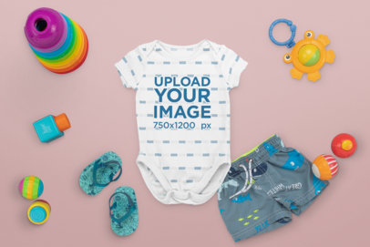 Mockup of a Baby Onesie Surrounded by Toys M1129