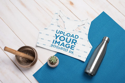 Sublimated Sports Bra Mockup Featuring Yoga Accessories and a Succulent