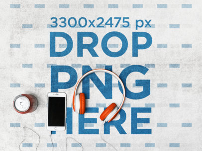 Mockup of an iPhone and Orange Headphones Lying on a Towel