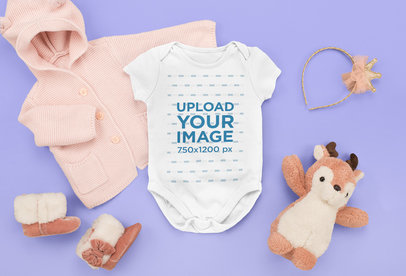 Onesie Mockup Featuring a Cute Outfit and a Stuffed Animal m1144
