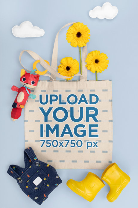Tote Bag Mockup Featuring a Baby Outfit for a Rainy Day