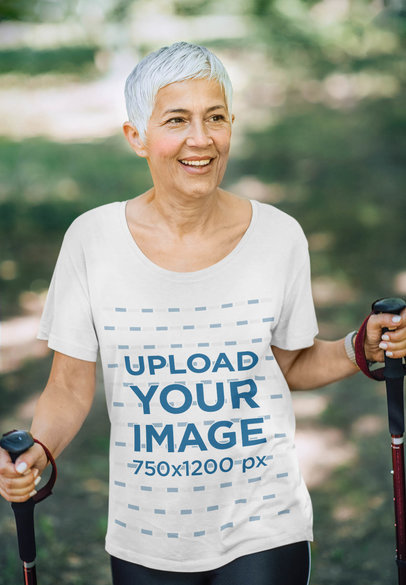 T-Shirt Mockup of a Senior Hiker Enjoying Her Day