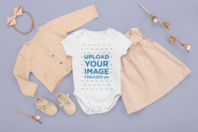 Onesie Mockup Featuring a Girl's Outfit in a Flat Lay Style M1138
