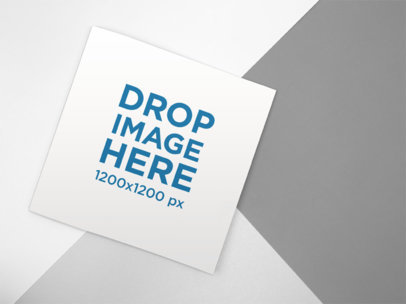 Square Booklet Mockup Lying on a Tricolor Background a15131