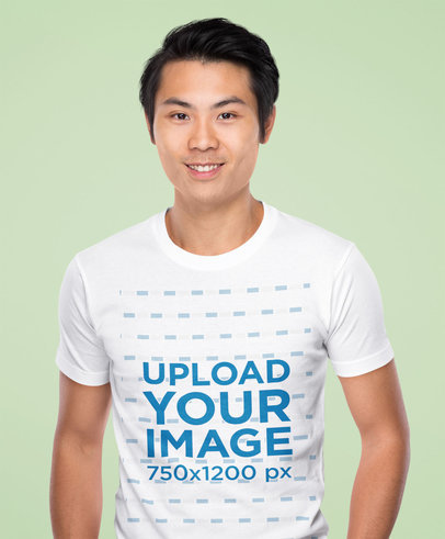 Crew-Neck Tee Mockup of a Smiling Man at a Studio