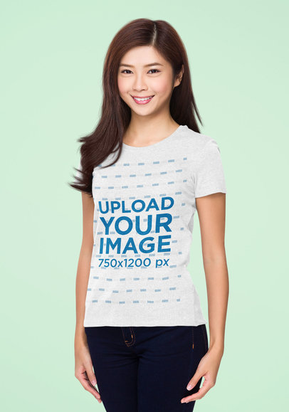 Simple Mockup of a Happy Woman Modeling a T-Shirt in a Studio