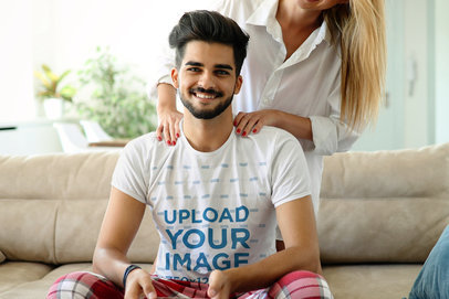 T-Shirt Mockup of a Man Being Pampered by His Girlfriend