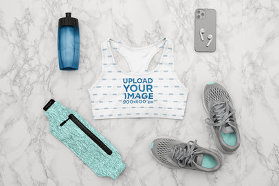 Flat Lay Mockup of a Sports Bra Featuring a Gym Outfit