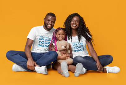 T-Shirt Mockup Featuring a Happy Family at a Studio 