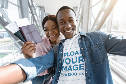 T-Shirt Mockup of a Happy Man Traveling With His Girlfriend