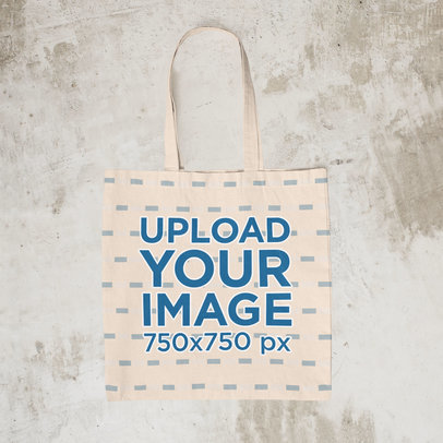 Mockup of an Empty Tote Bag on a Surface with a Raggedy Texture m1255