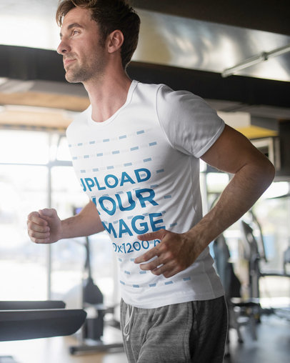 T-Shirt Mockup Featuring a Man Jogging on a Treadmill