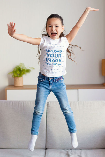 T-Shirt Mockup of a Little Girl Playing in Her Living Room