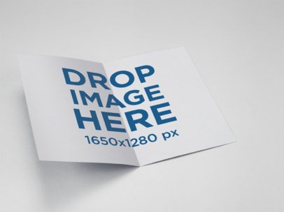Bifold Brochure Mockup Lying on a Solid Color Surface