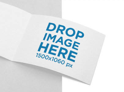 Open Booklet Mockup Lying on a Bicolor Surface a15125