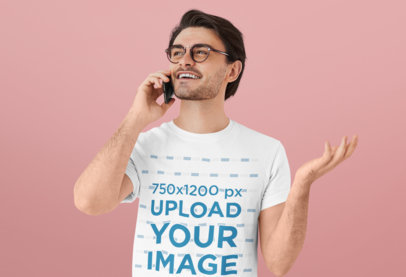 T-Shirt Mockup of a Young Bearded Man Talking on the Phone