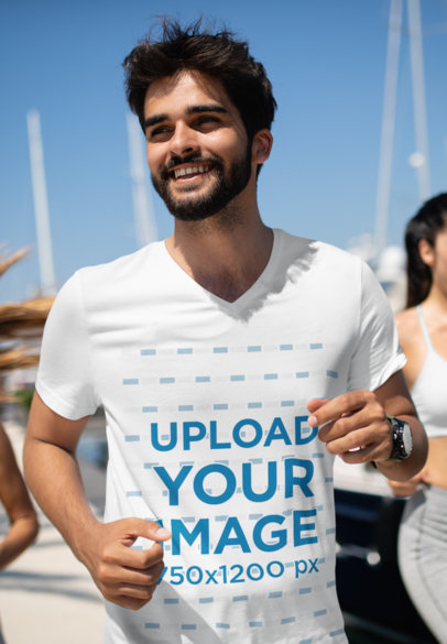 V-Neck Tee Mockup of a Young Bearded Man Running 