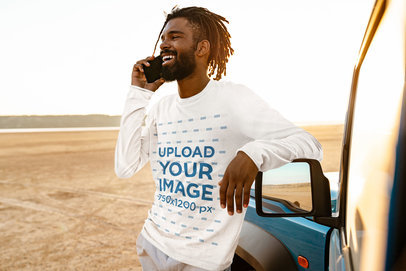 Long Sleeve Tee Mockup Featuring a Happy Man Making a Call by His Car 