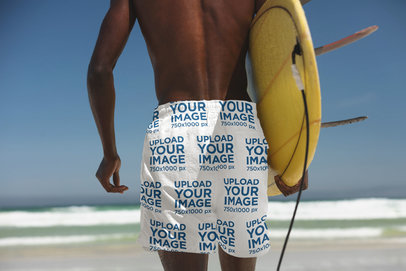 Back-View Swim Trunks Mockup of a Surfer at the Beach 40979-r-el2