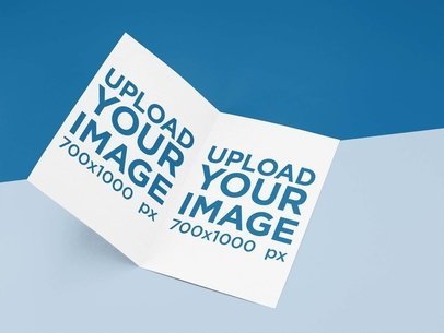 Bifold Brochure Mockup Lying on a Bicolor Surface