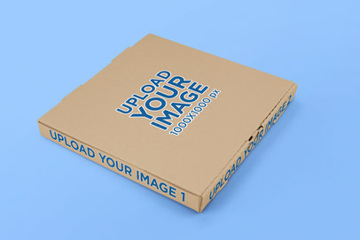 Mockup of a Pizza Box Lying on a Solid Color Surface