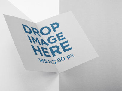 Floating Open Booklet Mockup Against a Bicolor Background a15216