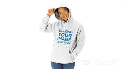 Video of a Happy Woman Showcasing Her Hoodie in a Studio