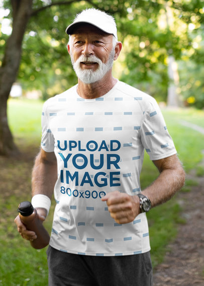 Mockup of a Senior Man Wearing a Sublimated T-Shirt While Jogging 
