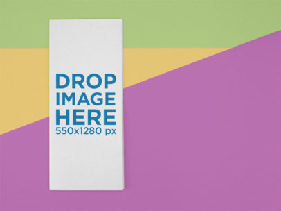 Front of a Trifold Brochure Mockup Lying on a Surface with Soft Colors a15208