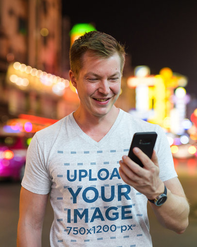 V-Neck T-Shirt Mockup of a Happy Man in the City at Night 42746-r-el2