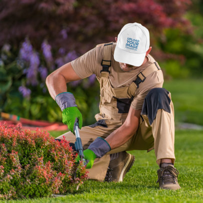 Dad Hat Mockup Featuring a Gardener Working on a Small Bush 42096-r-el2