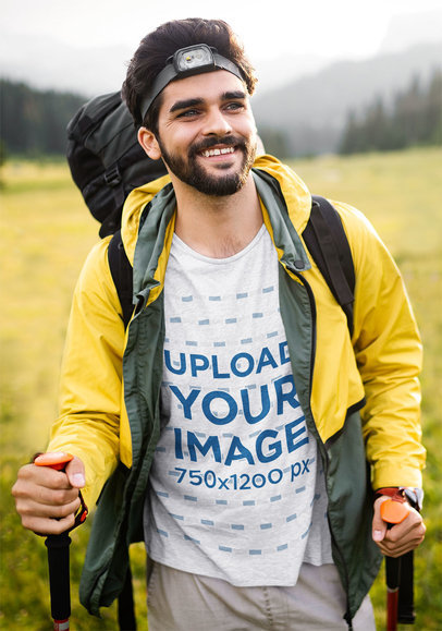 T-Shirt Mockup Featuring a Happy Man on a Hike