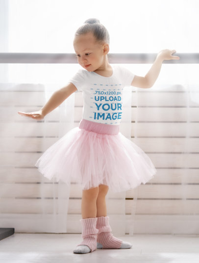 T-Shirt Mockup of a Little Ballerina in her Dancing Lesson