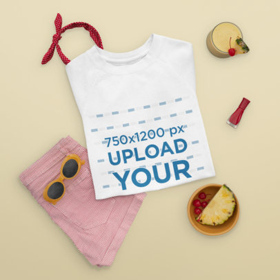 Mockup of a Folded Sweatshirt with a Spring Outfit and a Pina Colada