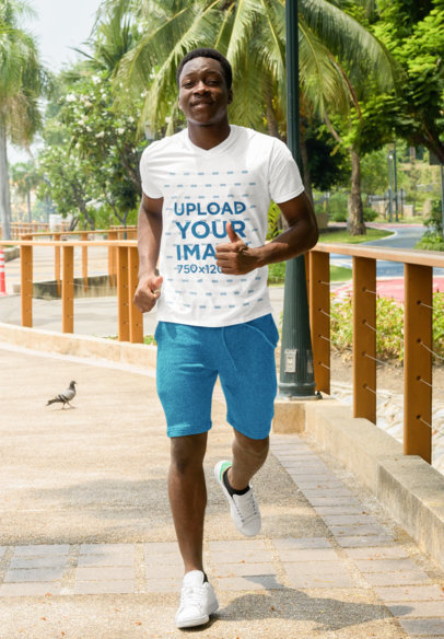 Mockup of a Man Wearing V-Neck Tee While Running 