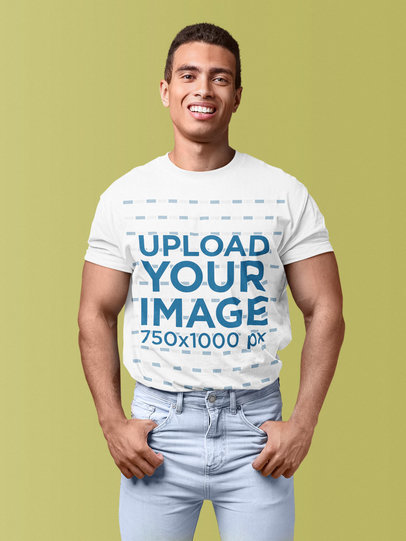 T-Shirt Mockup of a Muscular Man Standing at a Studio