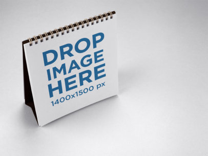 Mockup of a Calendar Standing on a Solid Surface a15217