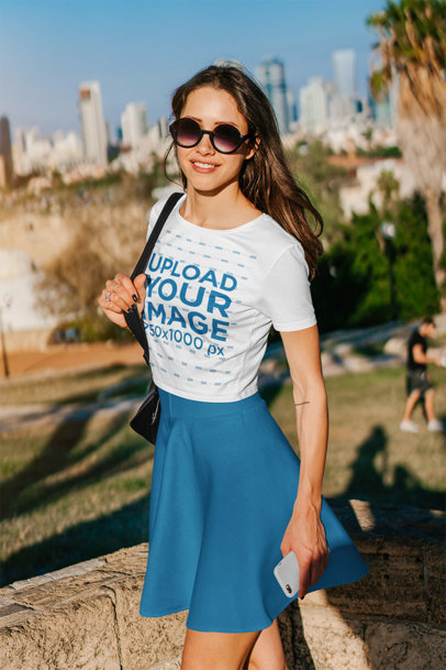 Crop Top Mockup of a Young Woman Wearing a Spring Outfit at a Park