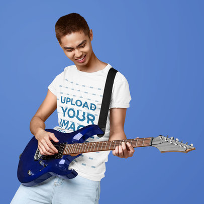 T-Shirt Mockup of a Guitar Player with a Customizable Background